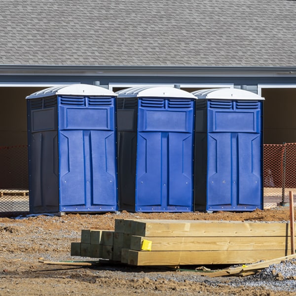 what is the cost difference between standard and deluxe portable toilet rentals in Oto